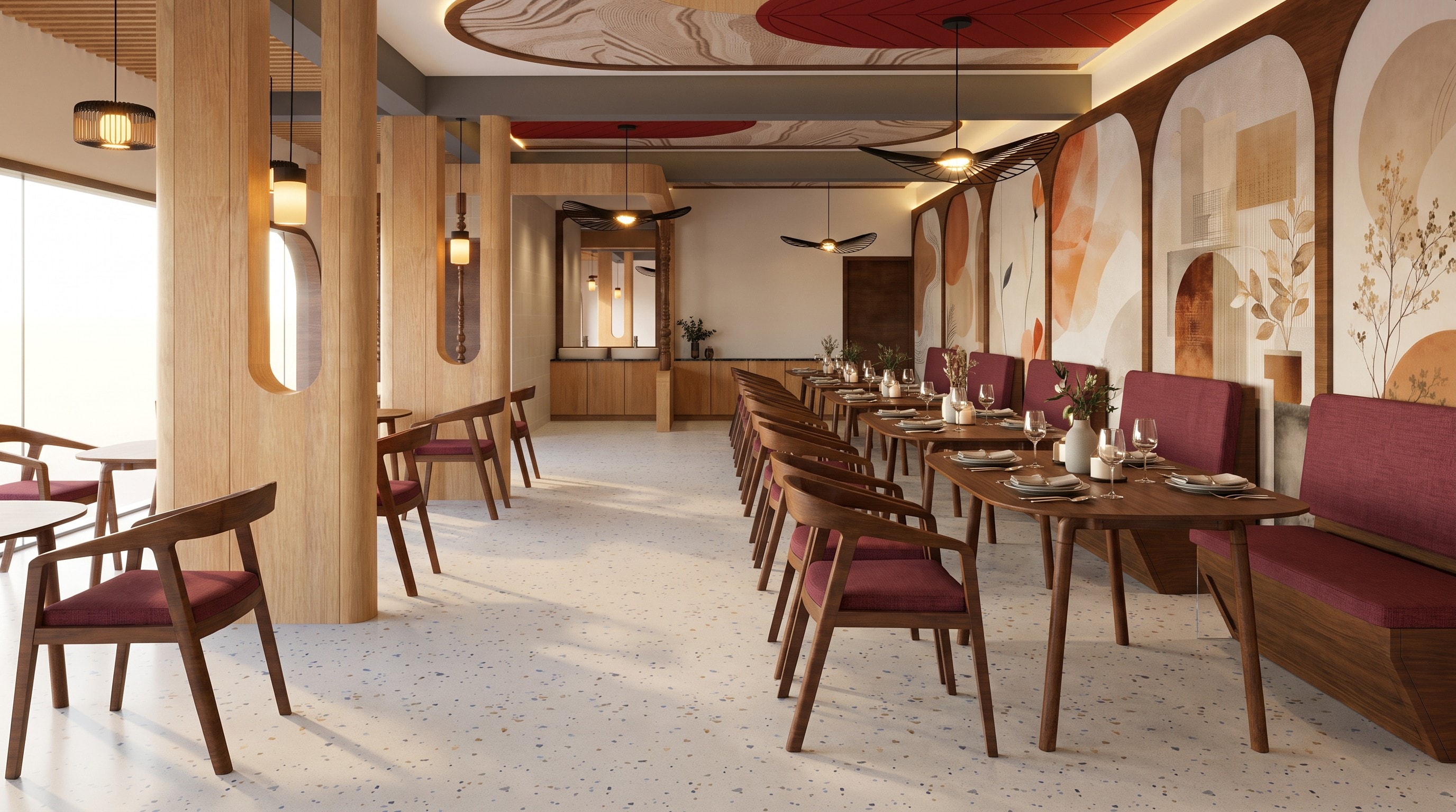 The restaurant at RK Sathyam Grand with terrazzo floors and wine-red chairs